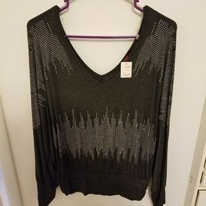 Brand new sparkly long sleeved gray shirt.